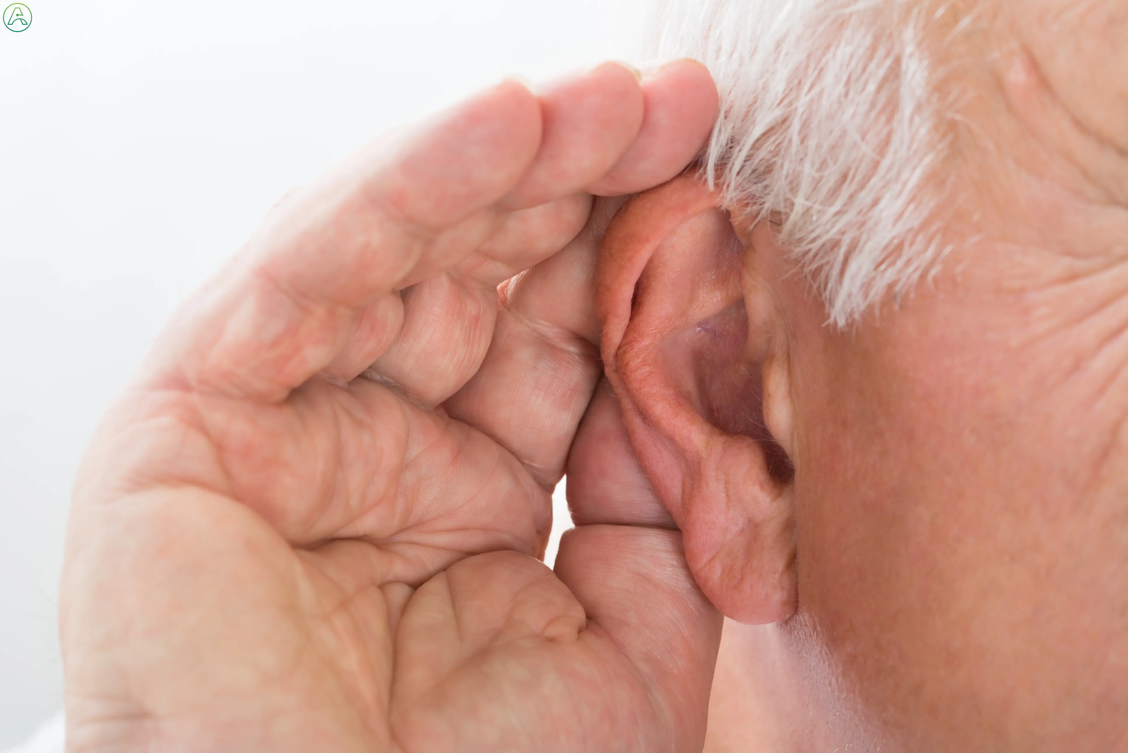 White man cups his hand up to his ear.