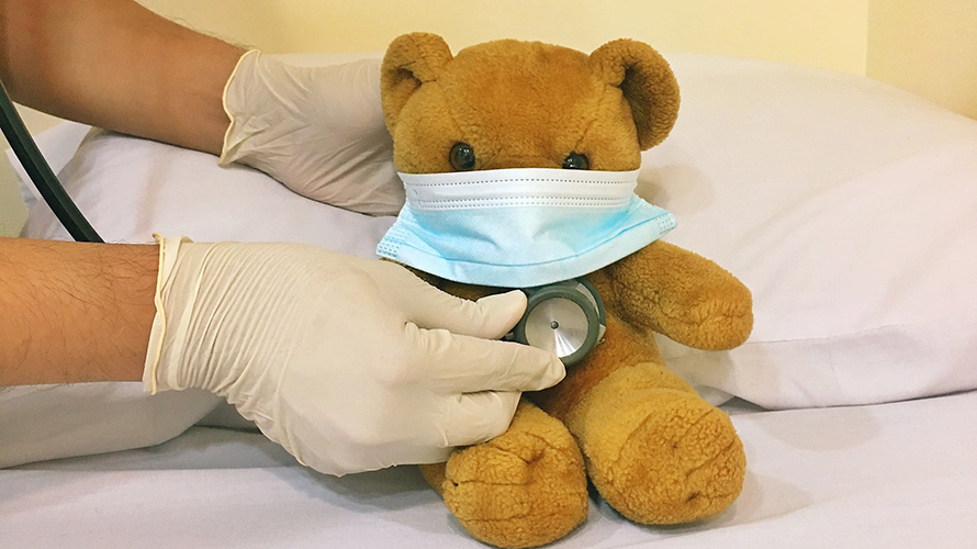 Doctor takes care of a stuffed bear