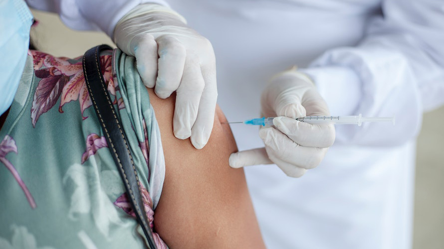 arm getting a vaccine shot
