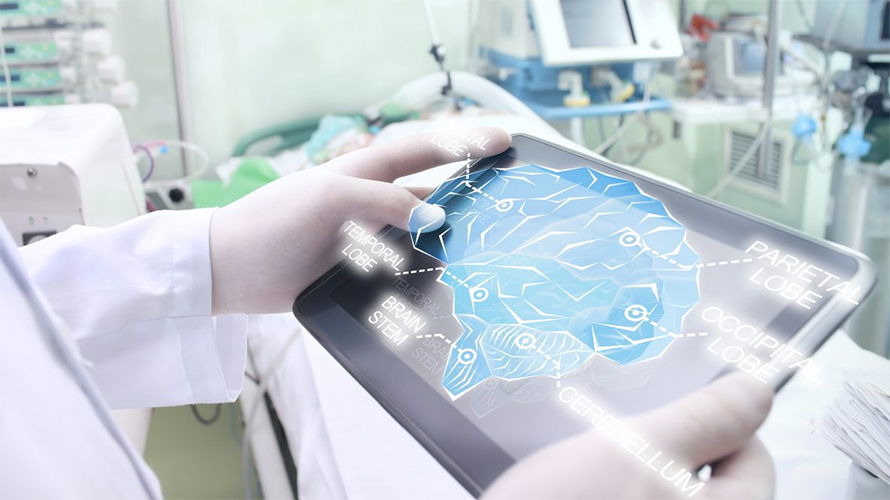Doctor holding tablet PC with Brain image showing.